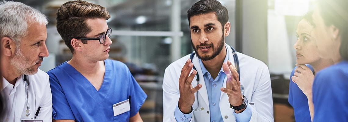 Physicians-talking-at-table